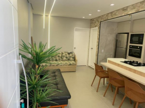 Apartamento Guarujà praia de pitangueiras 150mt da praia com serviço de praia 4 pessoas